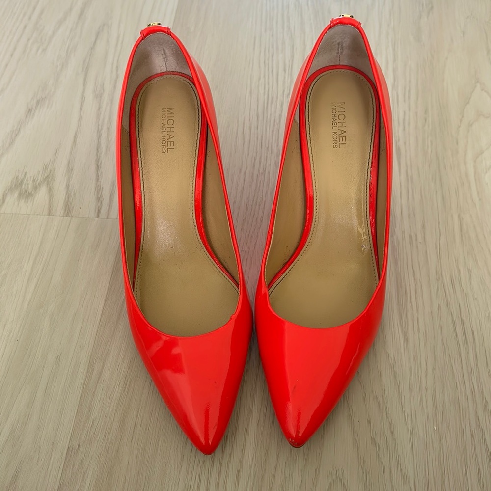 Michael Kors bright pink heals.